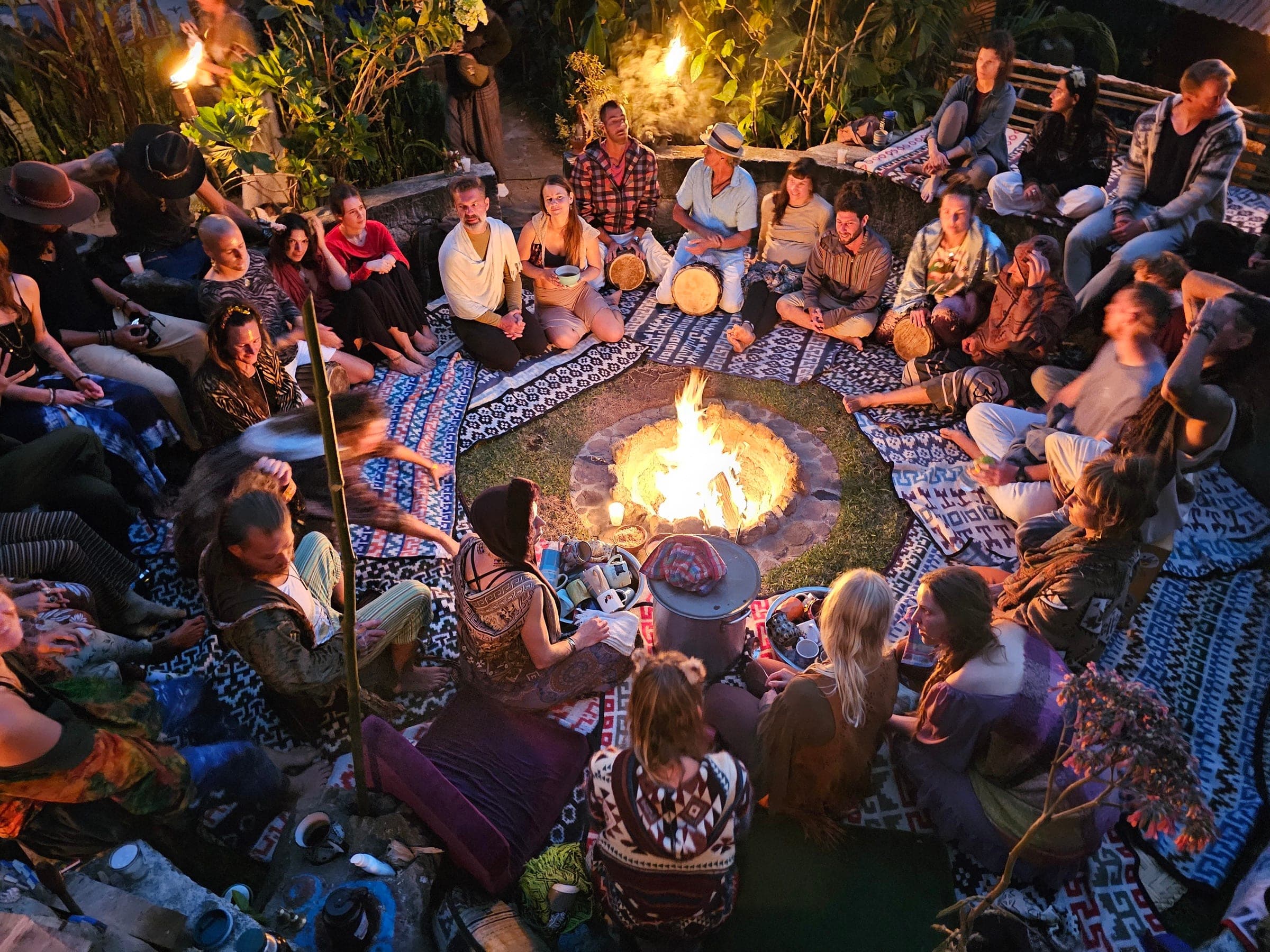 HeartSong circle with guitar and song at Mystical Yoga Farm