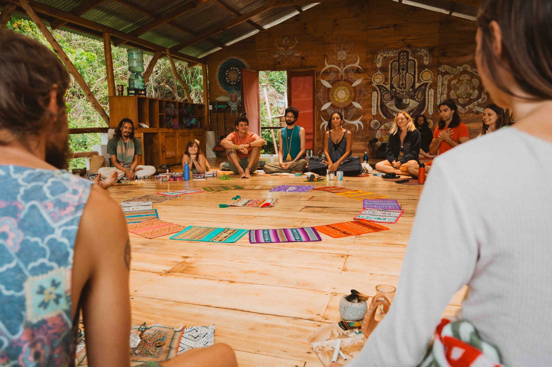 Sharing circle in a painted shala at Mystical Yoga Farm