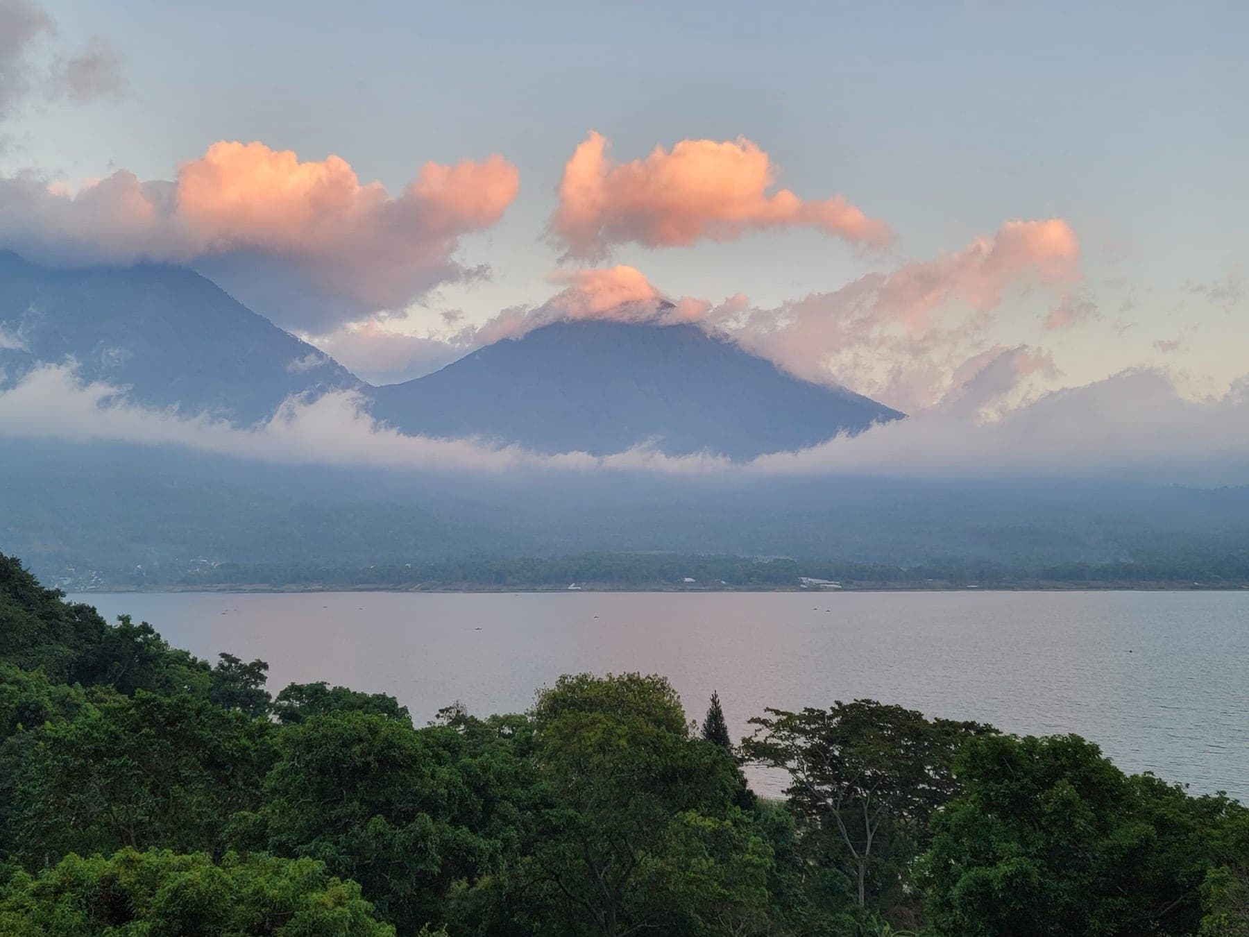 Volcanoes and Lake Atitlán at dusk, seen from the farm